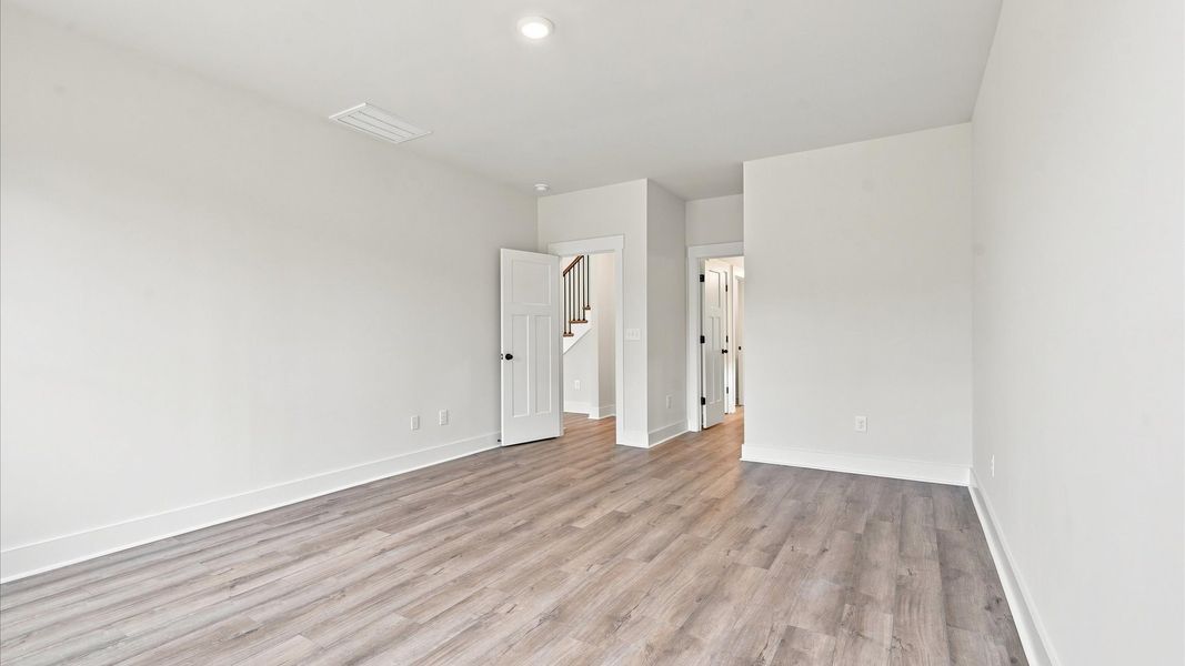 Tasteful primary suite featuring modern finishes and superior comfort near Downtown Clemson
