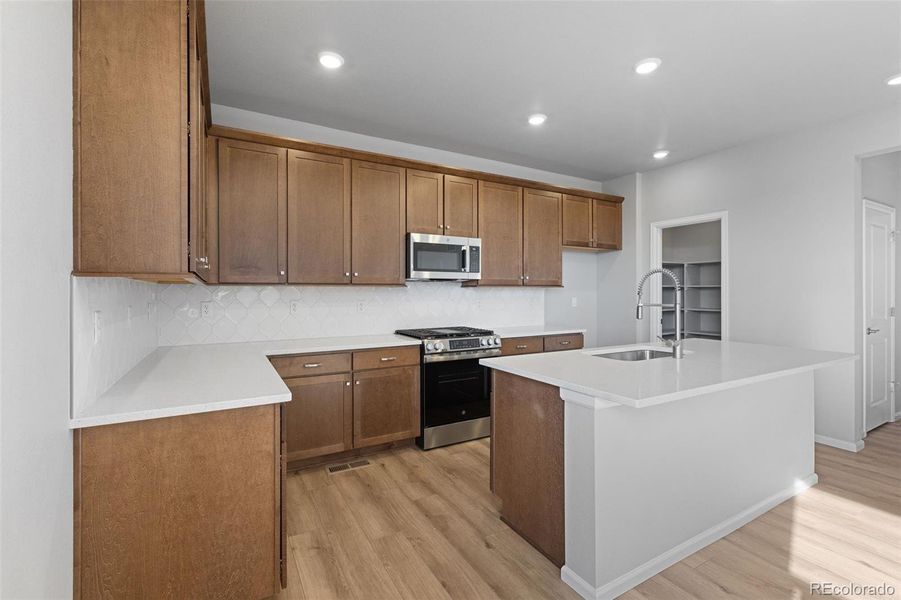Furnished interior view inside a new home in , Thornton (Image 5).