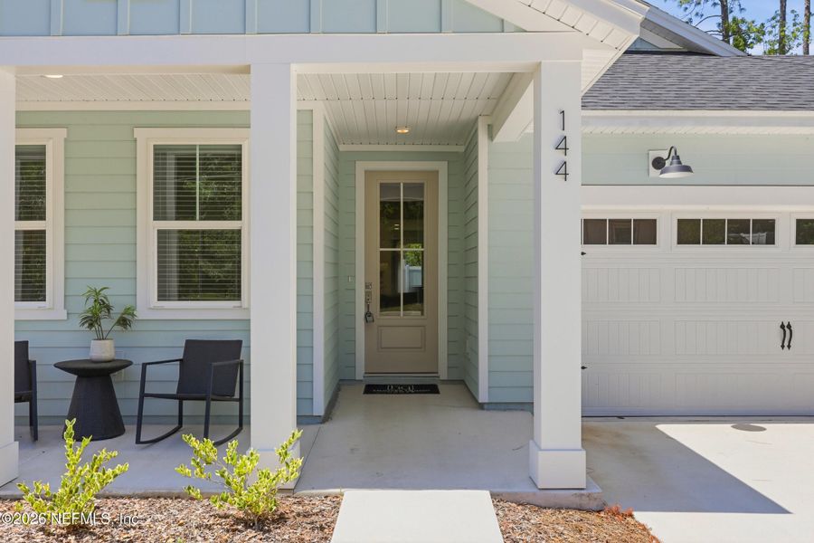 Exterior details and patio area of a home in Palm Coast Homes, Palm Coast (Image 3).