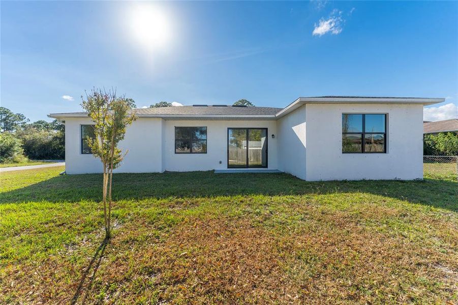 Exterior details and patio area of a home in , Palm Bay (Image 16). Exterior details and patio area of a home in , Palm Bay (Image 16).