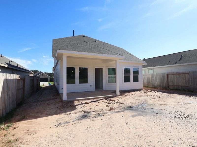 Exterior details and patio area of a home in Magnolia Ridge, Magnolia (Image 3).