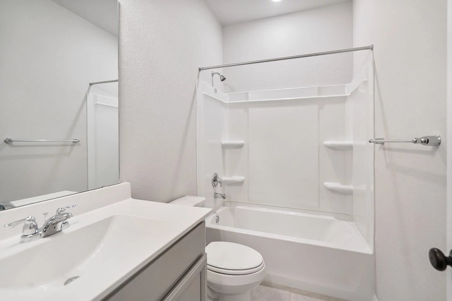 Representative furnished interior of a home built from the Granbury by Ashton Woods in The Trails at Carmel, Pflugerville (Image 42).