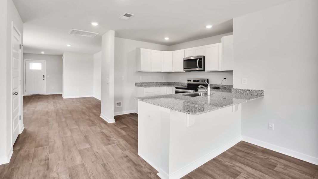 Furnished interior view inside a new home in Lockwood Landing, Supply (Image 7).