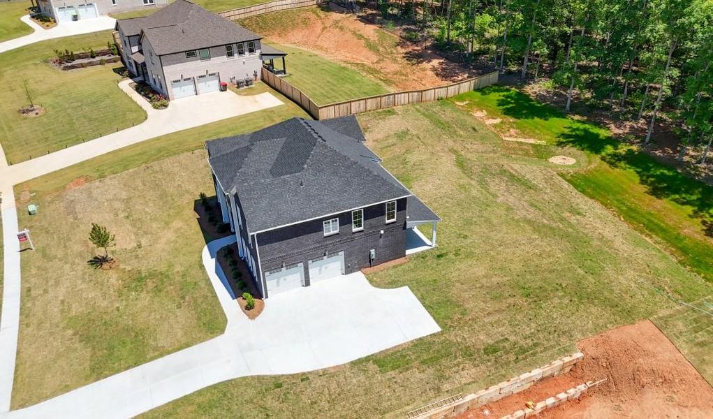 Front exterior of a new home in , Griffin, GA, highlighting curb appeal (Image 30).