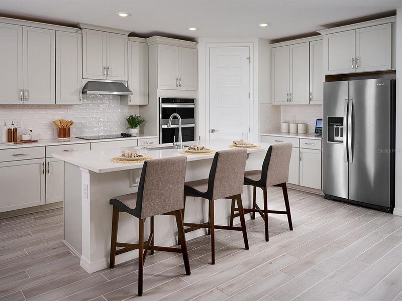 Furnished interior view inside a new home in The Grove at Stuart Crossing - Signature Series, Bartow (Image 5).