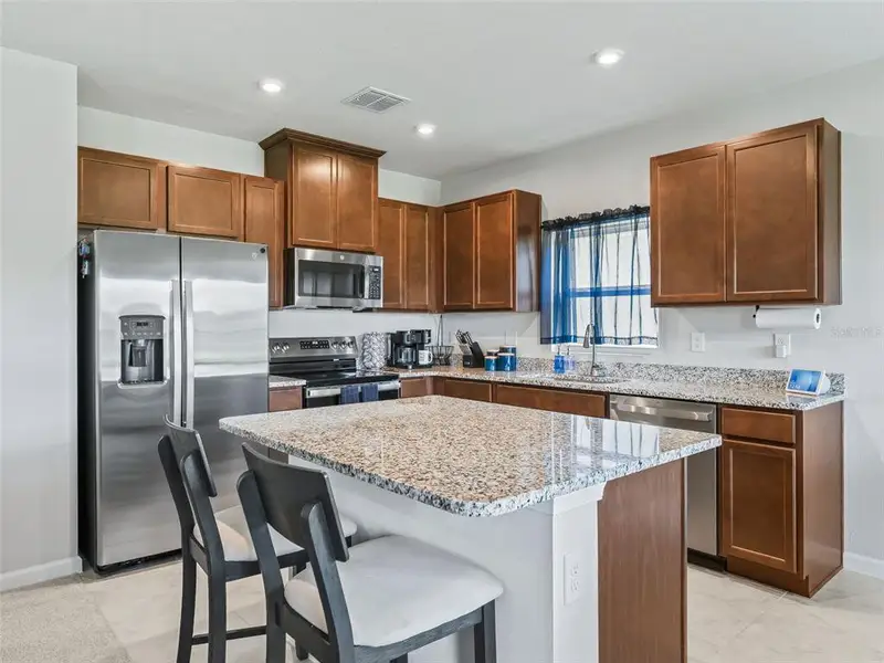 Furnished interior view inside a new home in , Sumterville (Image 8).