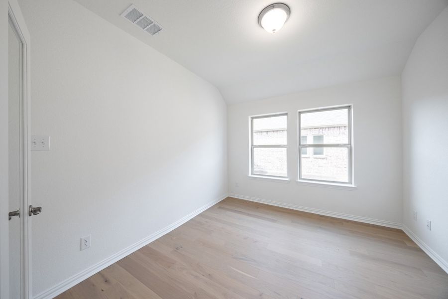 Spacious, unfurnished interior of a new home in Verandah, Royse City (Image 23).