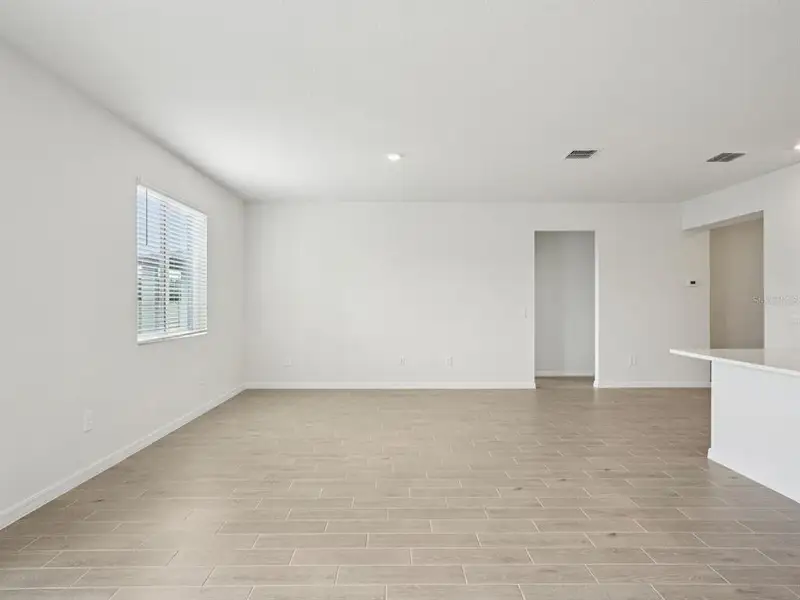 Spacious, unfurnished interior of a new home in Oakfield Trails - Classic Series, Parrish (Image 14).