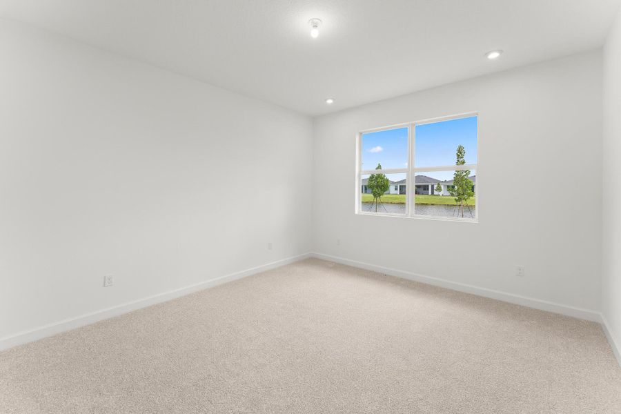 Spacious, unfurnished interior of a new home in Tradition - Cadence, Port St. Lucie (Image 10).