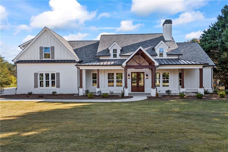 Front exterior of a new home in , Monroe, GA, highlighting curb appeal (Image 31).