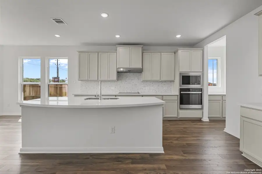 Furnished interior view inside a new home in Megan's Landing, Castroville (Image 9).
