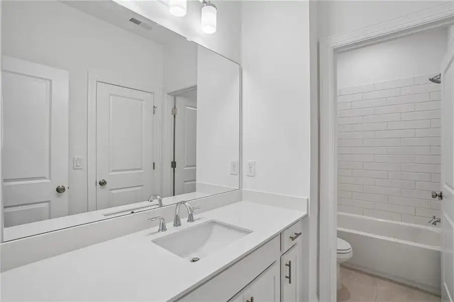 Furnished interior view inside a new home in Waterhaven, Cumming (Image 7).