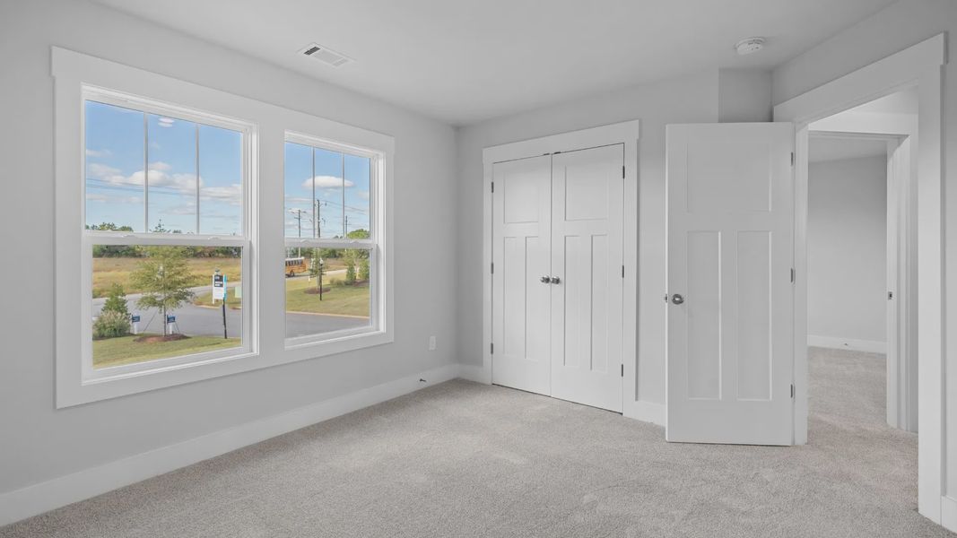 2 story single family home, all white, bedroom