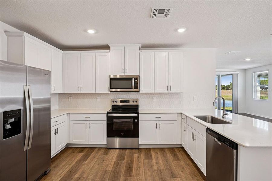 Furnished interior view inside a new home in Ridgehaven - Villas, Ormond Beach (Image 10).