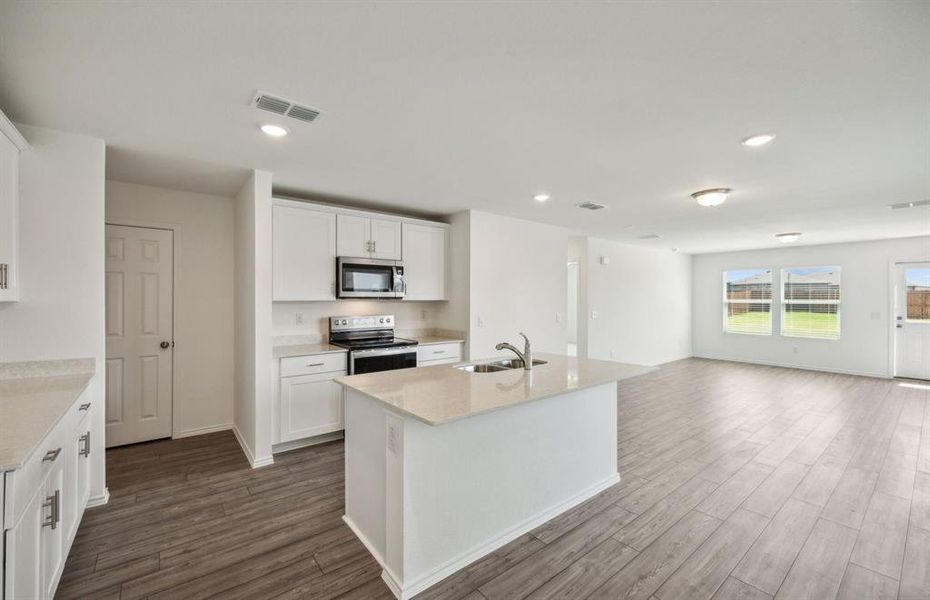 Airy kitchen with large windows *real home pictured