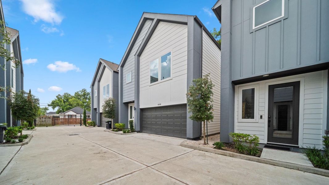Front exterior of a new home in Highland Heights, Houston, TX, highlighting curb appeal (Image 19).
