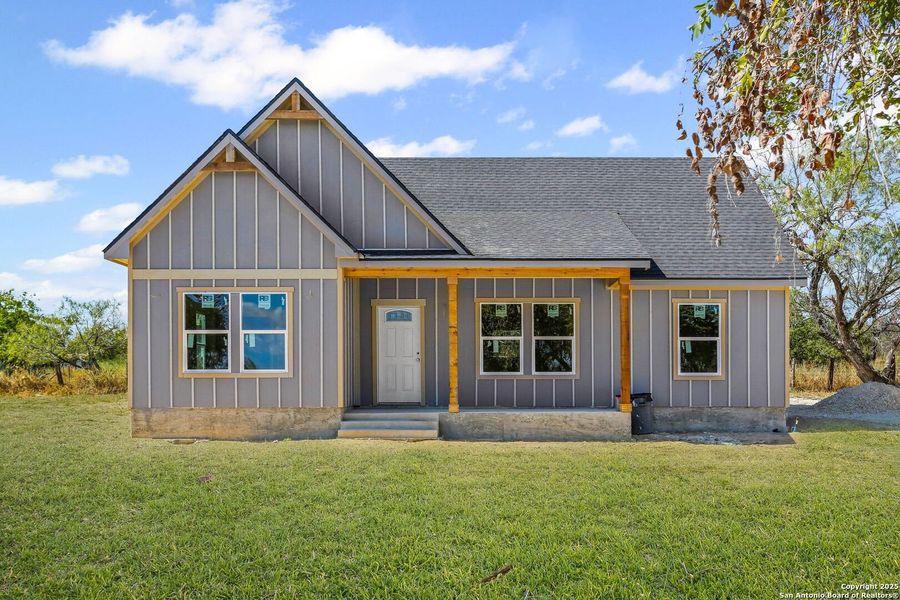 Front exterior of a new home in , Lytle, TX, highlighting curb appeal (Image 6). Front exterior of a new home in , Lytle, TX, highlighting curb appeal (Image 6).