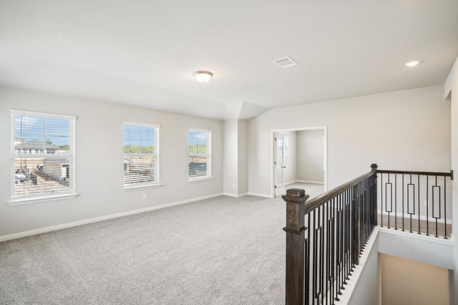 Second floor landing of the Reynolds floorplan at a Meritage Homes community.