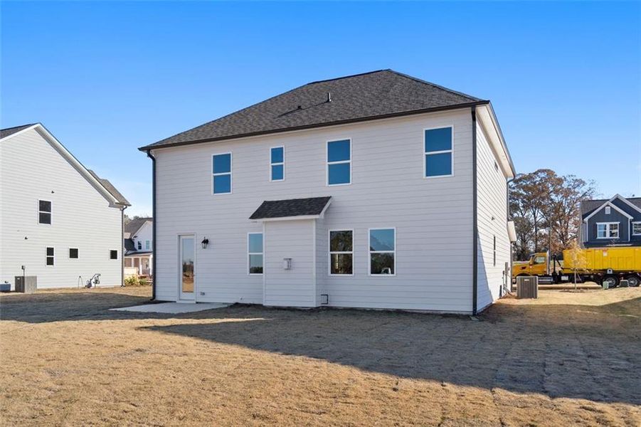 Front exterior of a new home in Wehunt Meadows, Hoschton, GA, highlighting curb appeal (Image 10).