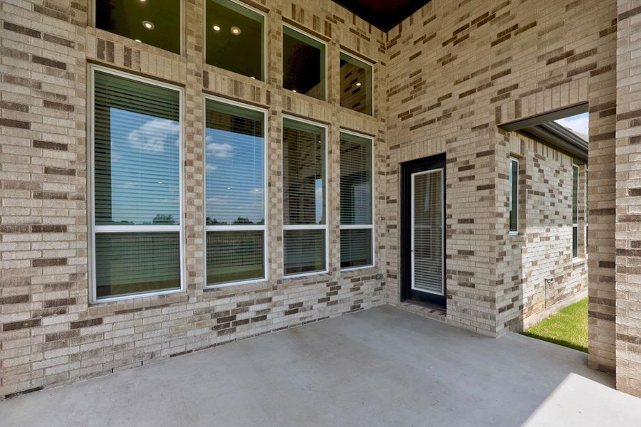 Exterior details and patio area of a home in Santa Rita Ranch, Liberty Hill (Image 2).