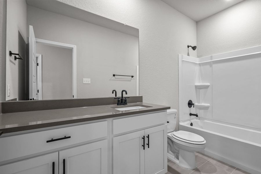 Representative furnished interior of a home built from the The Glenwood E by Davidson Homes LLC in Bricewood, San Antonio (Image 13).