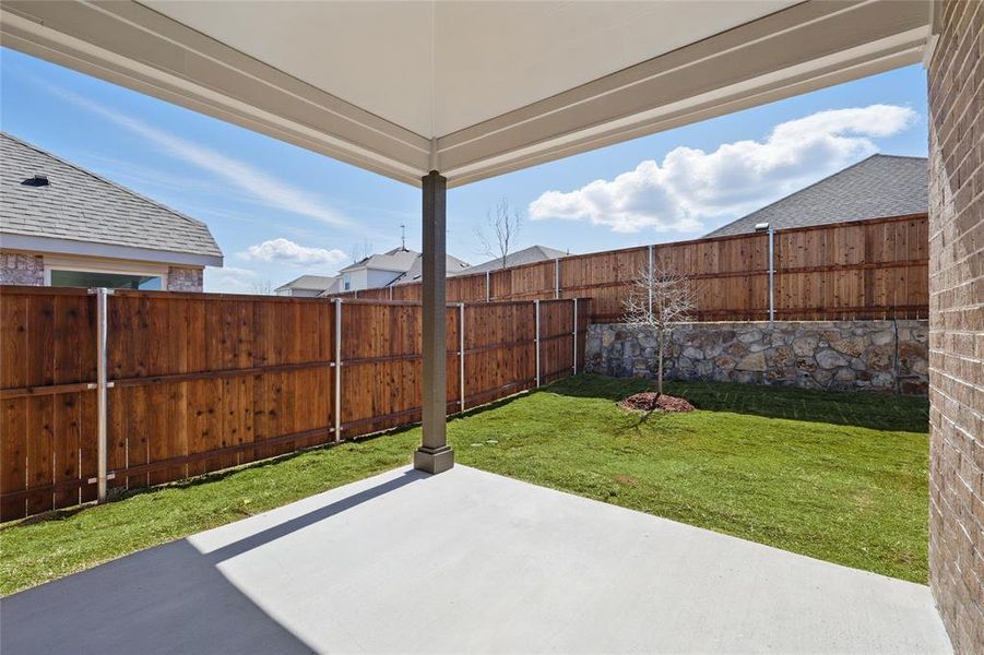 View of patio featuring a fenced backyard