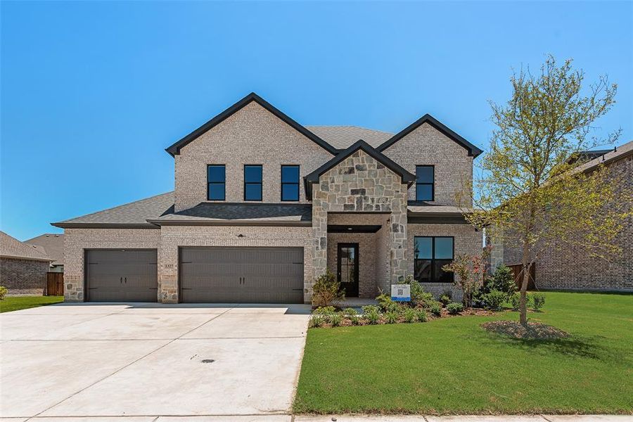 Front exterior of a new home in , Van Alstyne, TX, highlighting curb appeal (Image 1).