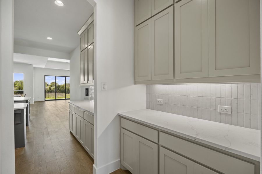 Furnished interior view inside a new home in Winding Creek, Rockwall (Image 16).