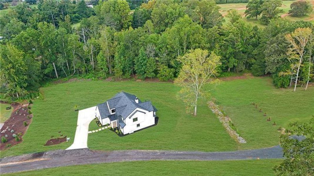 Front exterior of a new home in , Canton, GA, highlighting curb appeal (Image 36).