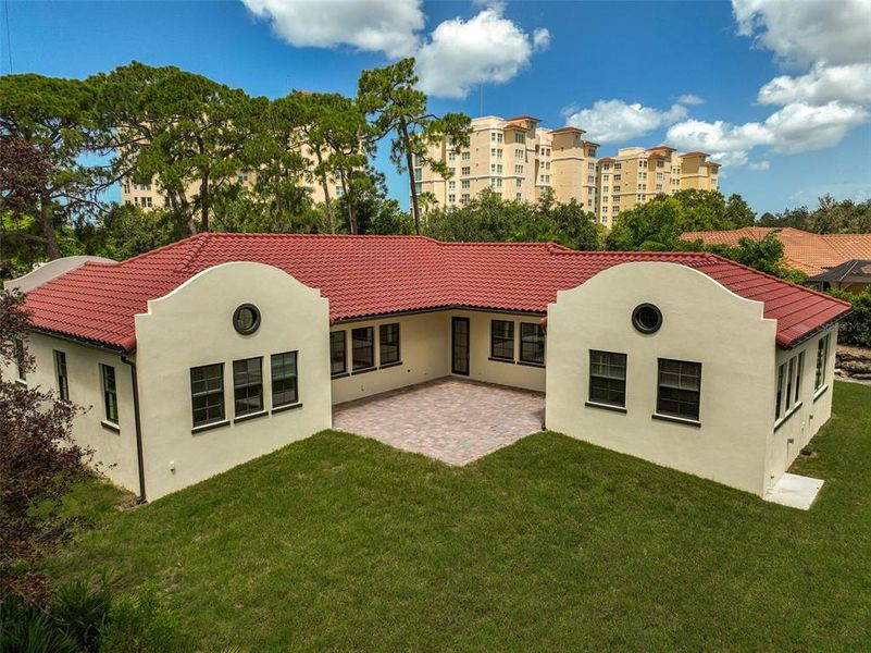 Exterior details and patio area of a home in , Osprey (Image 24).