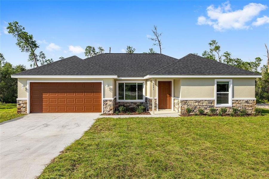 Front exterior of a new home in , Dunnellon, FL, highlighting curb appeal (Image 26). Front exterior of a new home in , Dunnellon, FL, highlighting curb appeal (Image 26).