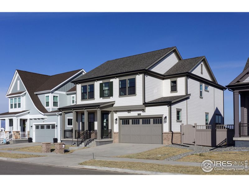 Front exterior of a new home in Westerly, Erie, CO, highlighting curb appeal (Image 20).