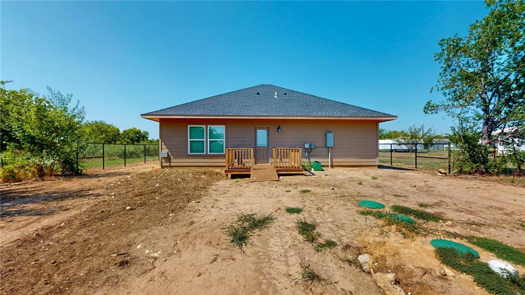 Front exterior of a new home in , Justin, TX, highlighting curb appeal (Image 14).