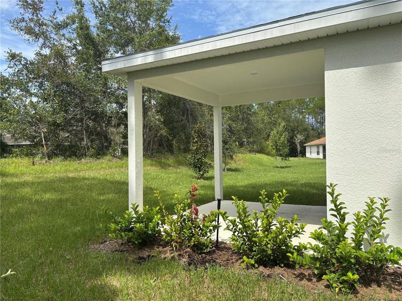 Exterior details and patio area of a home in Aspire at Palm Coast, Palm Coast (Image 28).