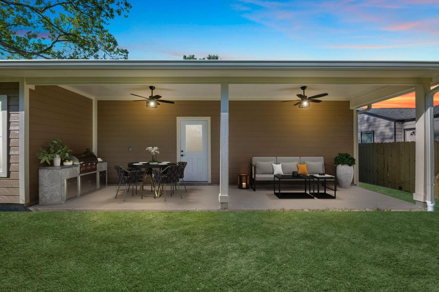 This back patio has gas hook-ups for your gas grill. Enjoy an evening grilling in this beautiful space. *virtually staged*