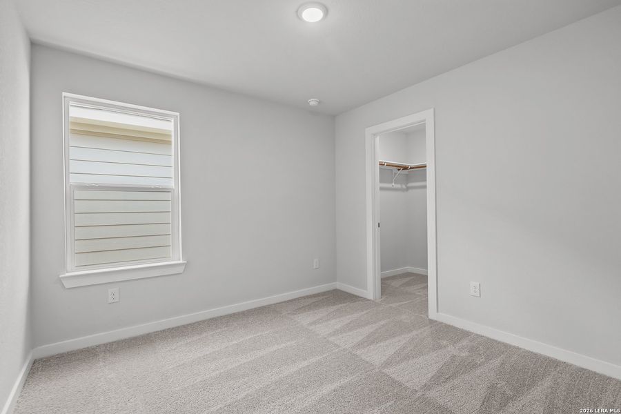 Spacious, unfurnished interior of a new home in Senna, Leon Valley (Image 19).