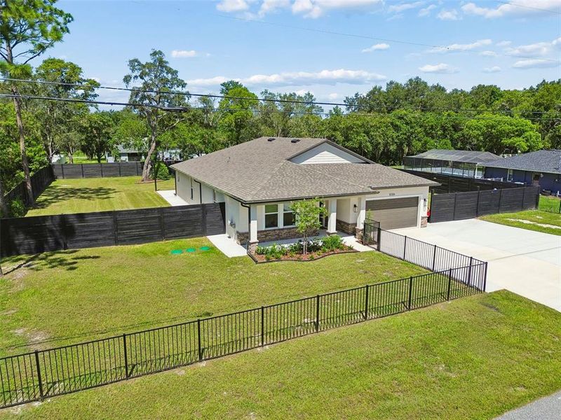 Front exterior of a new home in , Spring Hill, FL, highlighting curb appeal (Image 25).