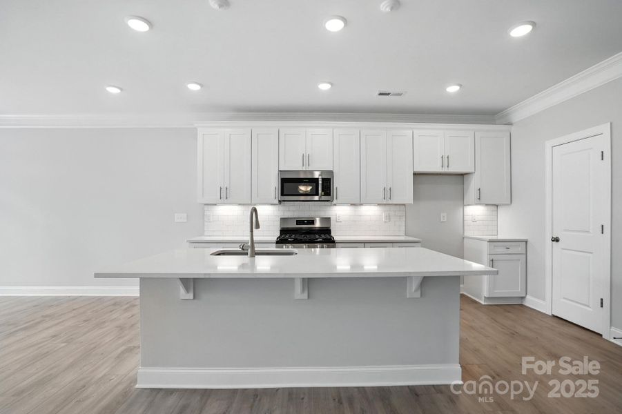 Furnished interior view inside a new home in Harrisburg Village Townhomes, Harrisburg (Image 5).