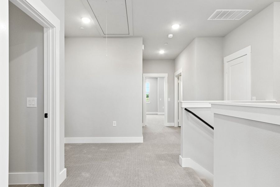 Spacious, unfurnished interior of a new home in The Tribute, The Colony (Image 24).