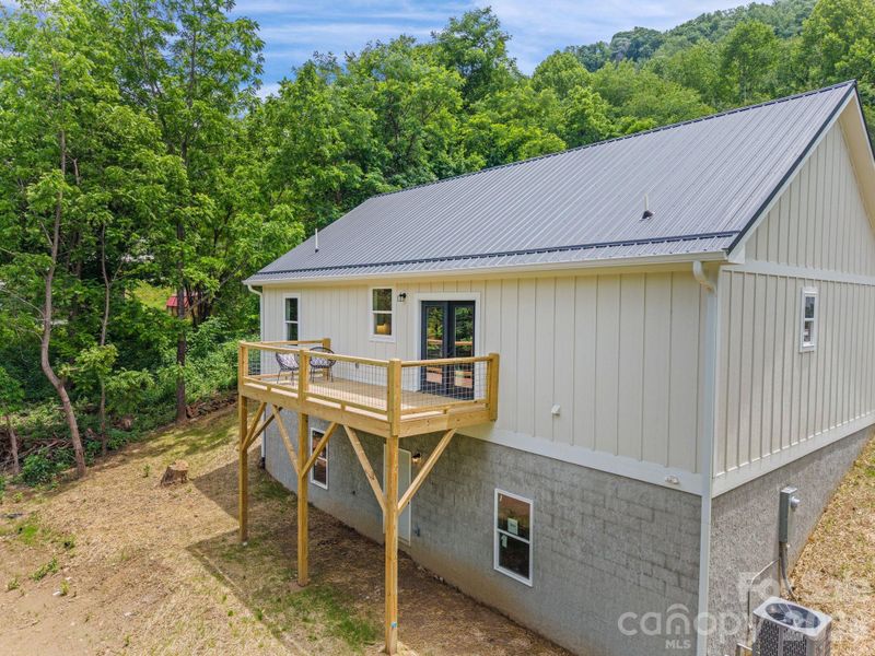 Exterior details and patio area of a home in , Waynesville (Image 26).