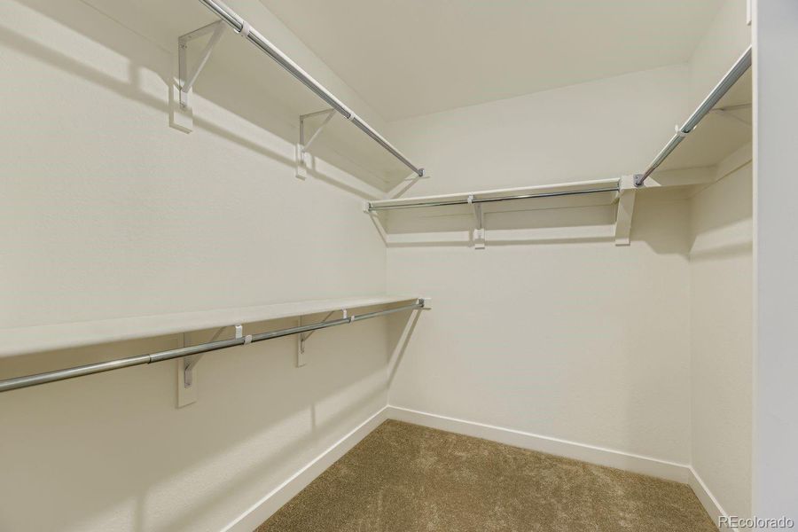 Spacious, unfurnished interior of a new home in Newlin Crossing: The Monarch Collection, Parker (Image 9).