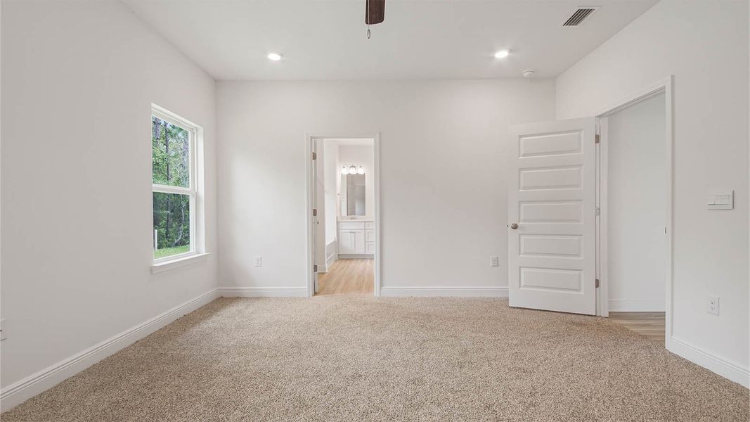 Representative unfurnished interior of a home built from the Kennedy by D.R. Horton in Bayside at Ward Creek, Panama City Beach (Image 26).