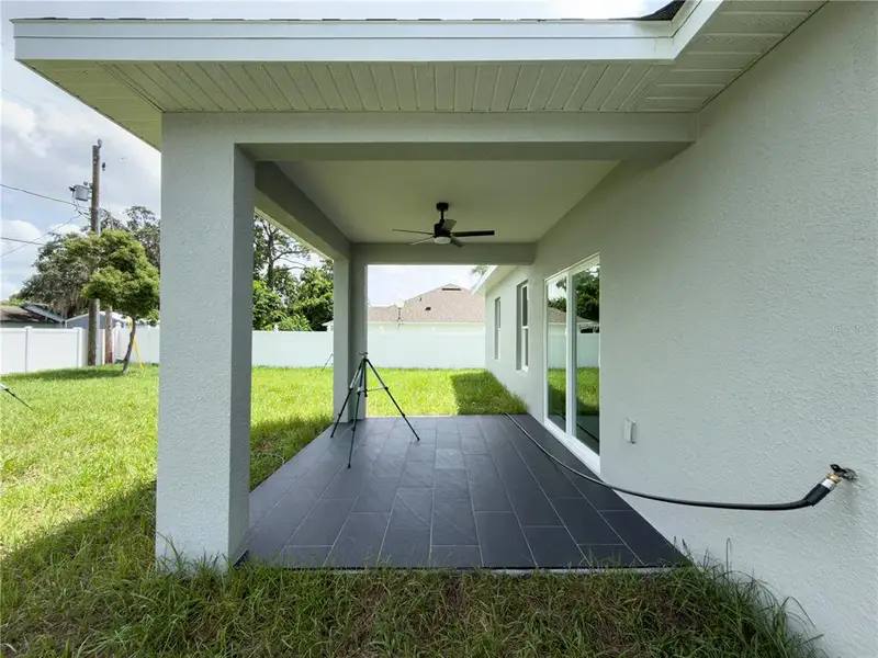 Exterior details and patio area of a home in , Deltona (Image 18).
