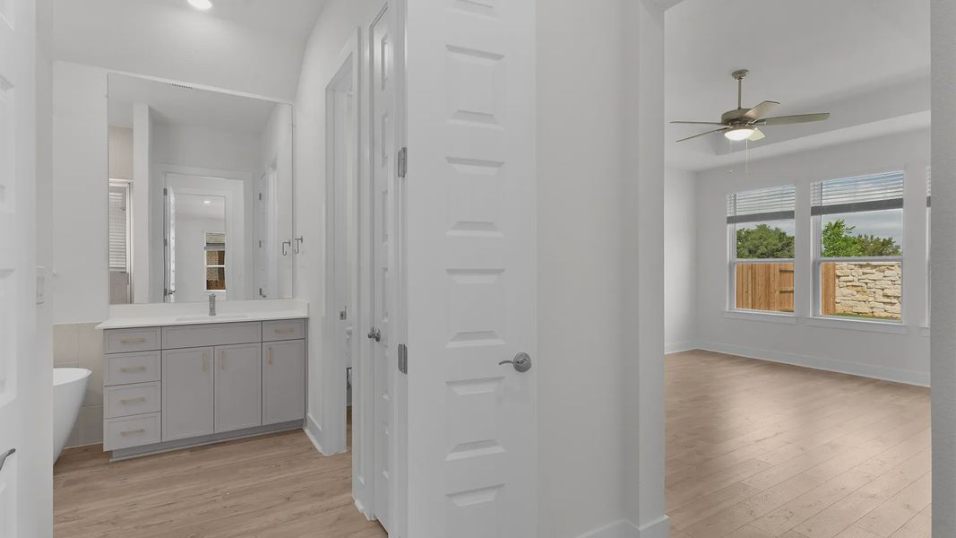 Representative furnished interior of a home built from the Mariah by Chesmar Homes in Crescent Bluff, Georgetown (Image 8).