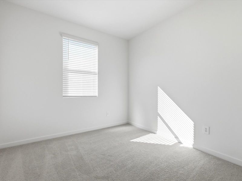 Spacious, unfurnished interior of a new home in Rancho Mirage Estate Series, Maricopa (Image 11).