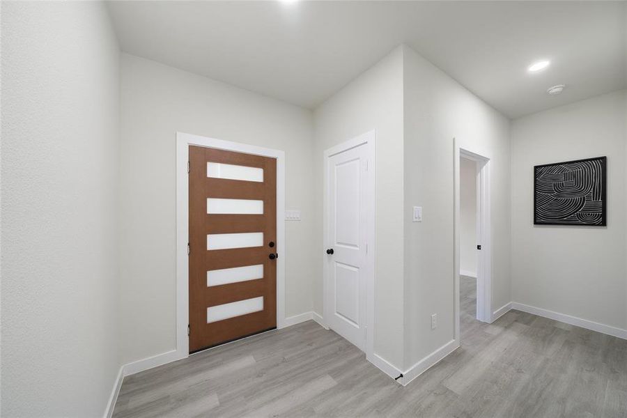 Foyer featuring light hardwood / wood-style flooring