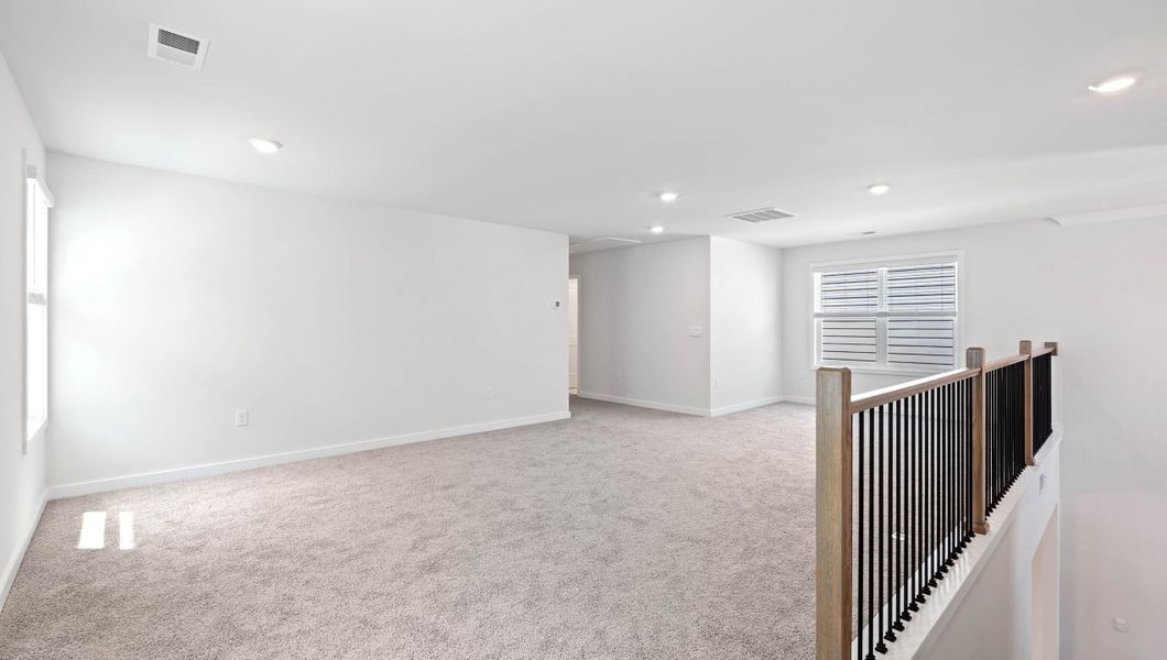 Spacious, unfurnished interior of a new home in Adams Glen, Greenville (Image 26).