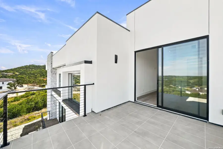 Exterior details and patio area of a home in , San Antonio (Image 56).