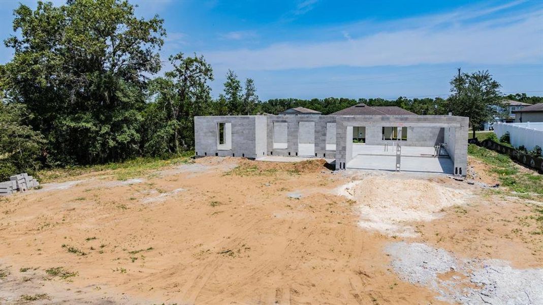 Front exterior of a new home in , Brooksville, FL, highlighting curb appeal (Image 9).