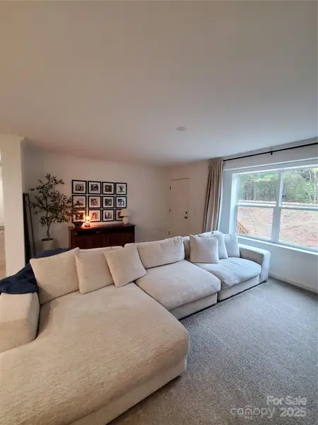 Furnished interior view inside a new home in , Olin (Image 9).